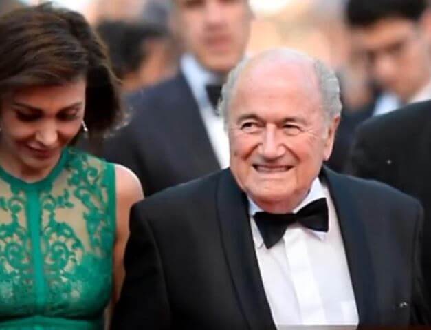 Linda Barras with Sepp Blatter in an event.